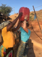 carrying water like an African